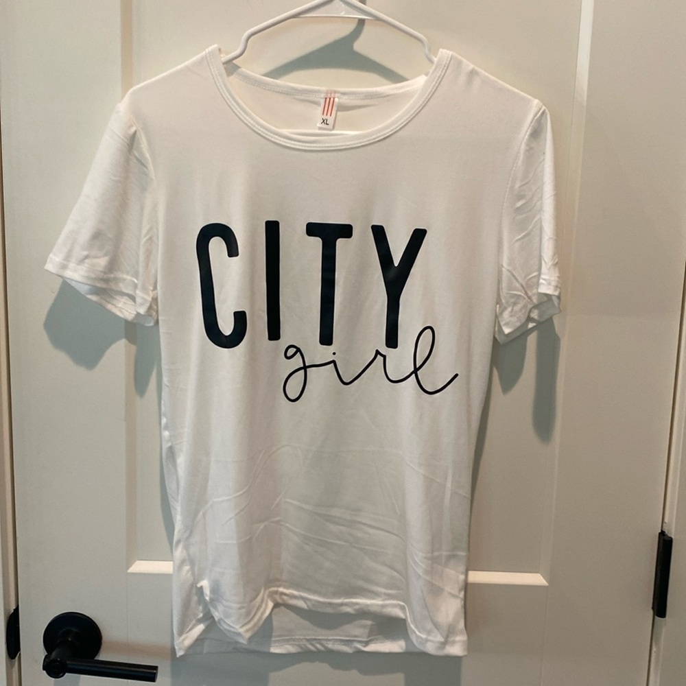 Girls White Dri-Fit Type Material w/City Girl Across the Front.  Size XL‎